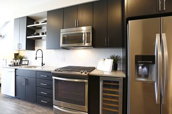 Modern kitchens with quartz countertops  stainless steel appliances